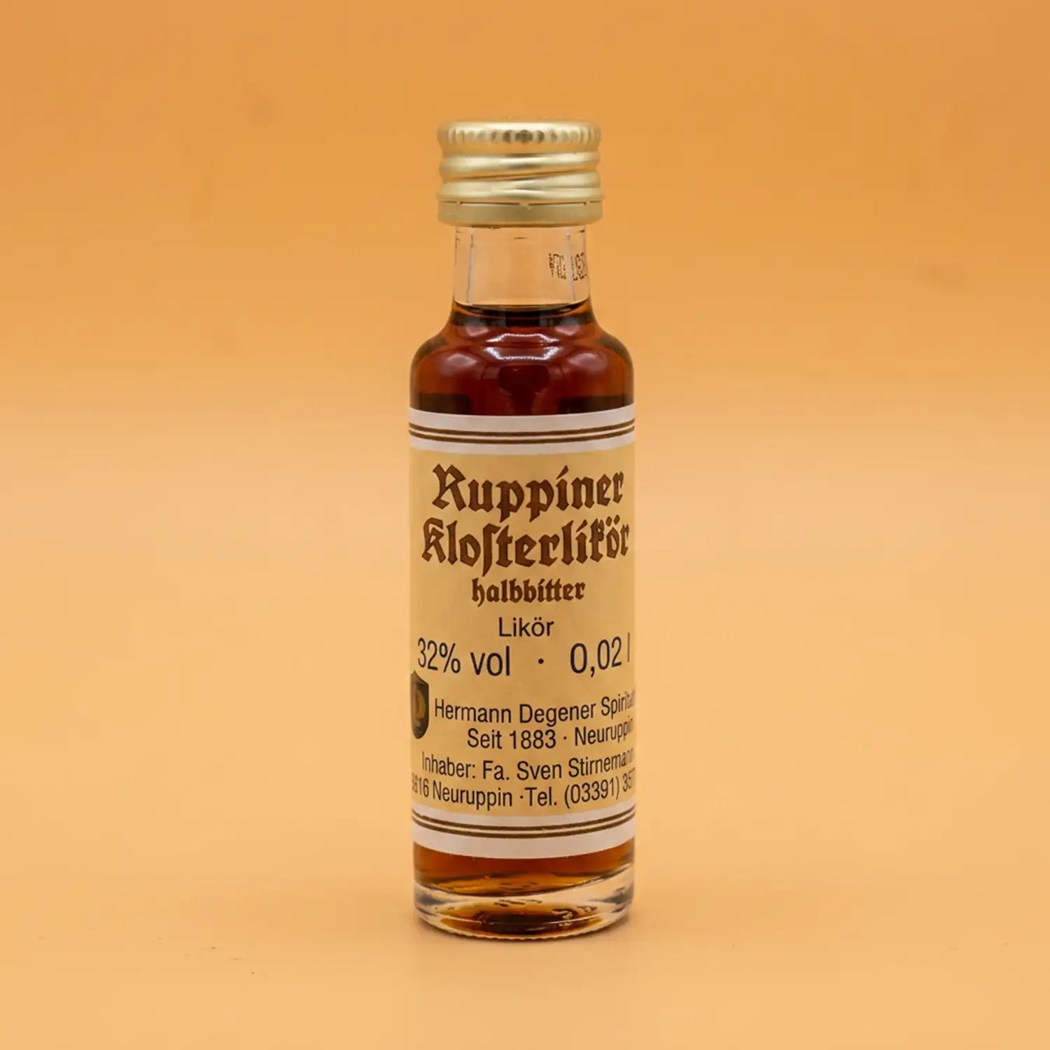 neuruppin-ruppiner-klosterlikoer-20ml-Vorderseite-mitorangepastelHintergrund